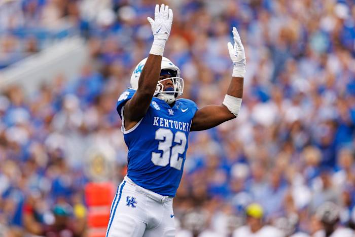Sep 9, 2023; Lexington, Kentucky, USA; Kentucky Wildcats linebacker Trevin Wallace (32) celebrates after the Kentucky Wildcats recover an Eastern Kentucky Colonels during the second quarter at Kroger Field. Mandatory Credit: Jordan Prather-USA TODAY Sports